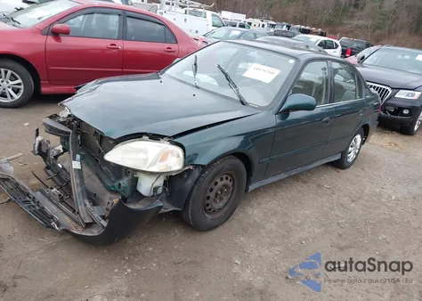 1999 Honda Civic Dx z USA, uszkodzony, nr VIN 2HGEJ6627XH502641